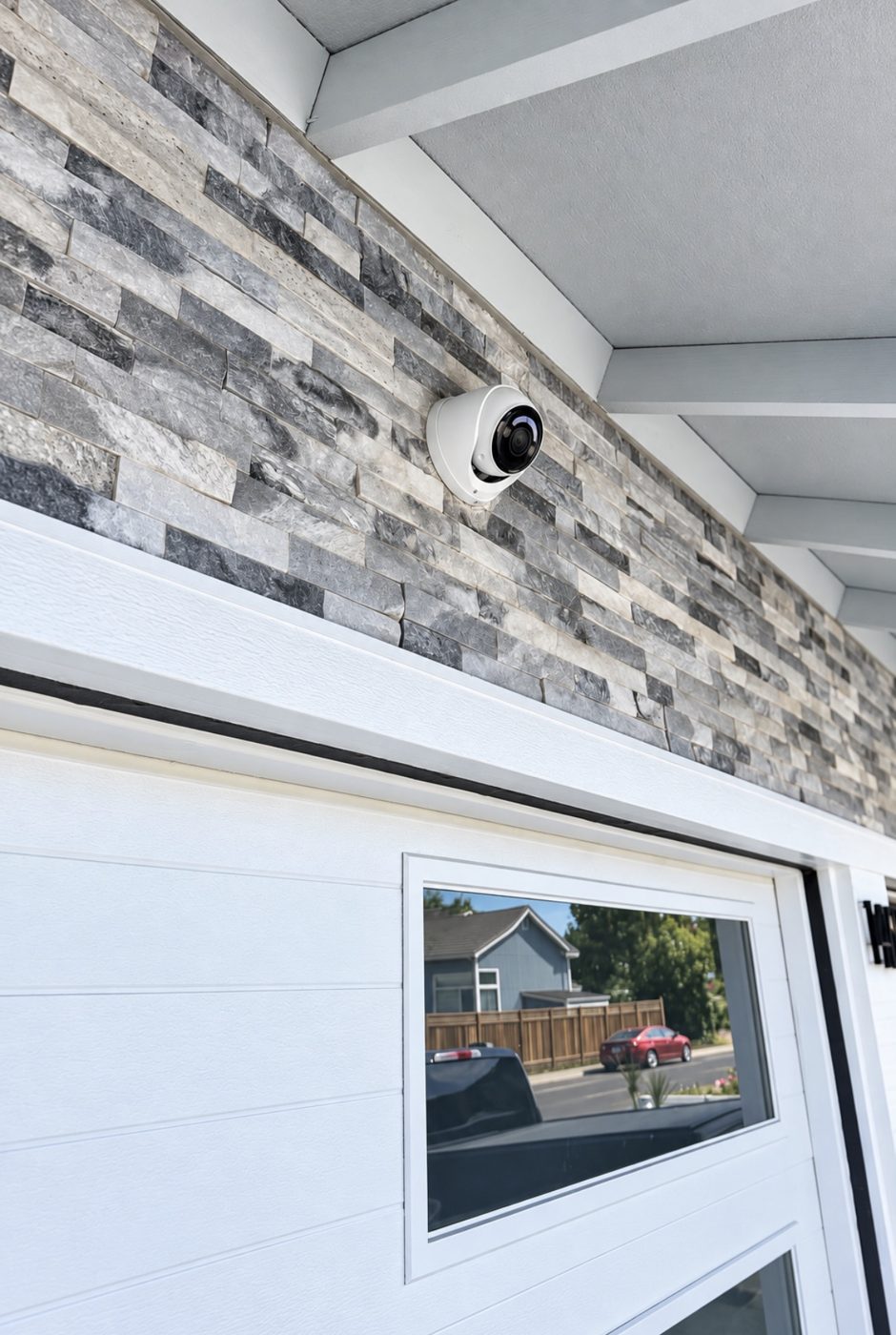 Lorex dome camera covering the garage and driveway