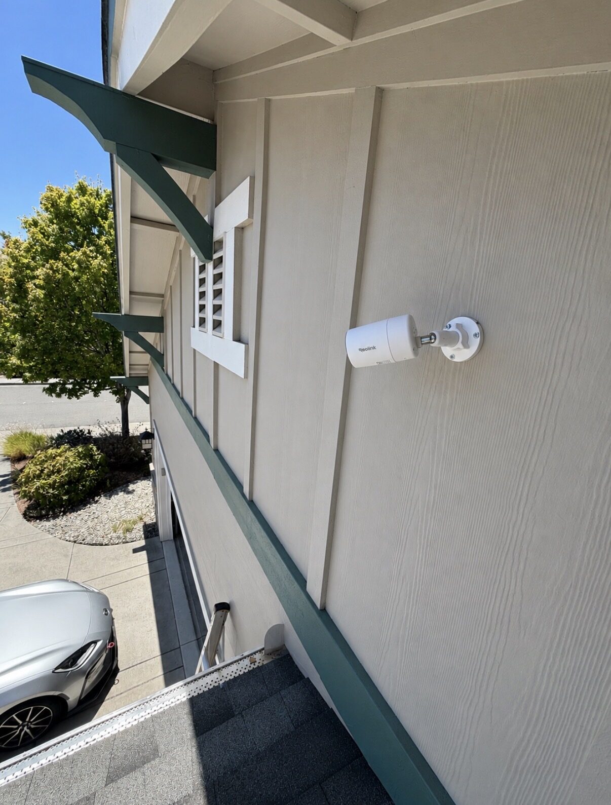 Camera mounted at roofline for a wide-angle view