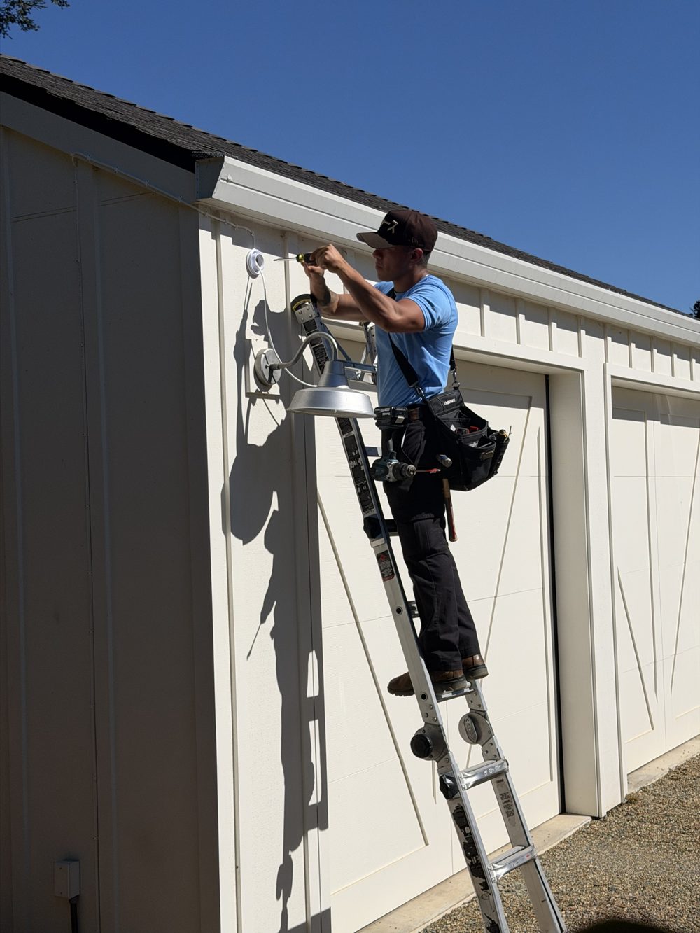Running camera cable along a garage roofline