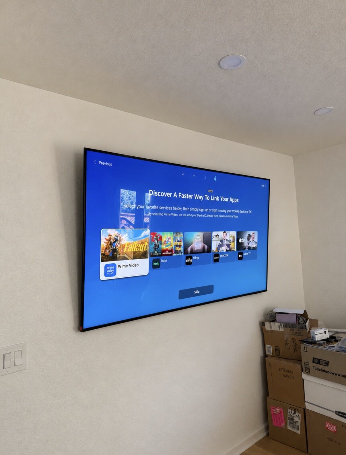 Wall-mounted TV with hidden cable routing